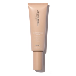 Сонцезахисний крем для обличчя з тонуючим ефектом