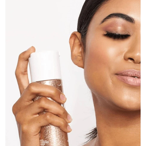 Фіксуючий спрей для макіяжу з ефектом сяйва у міні форматі