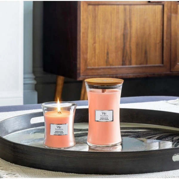 Ароматична свічка з ароматом персику, меду і манго