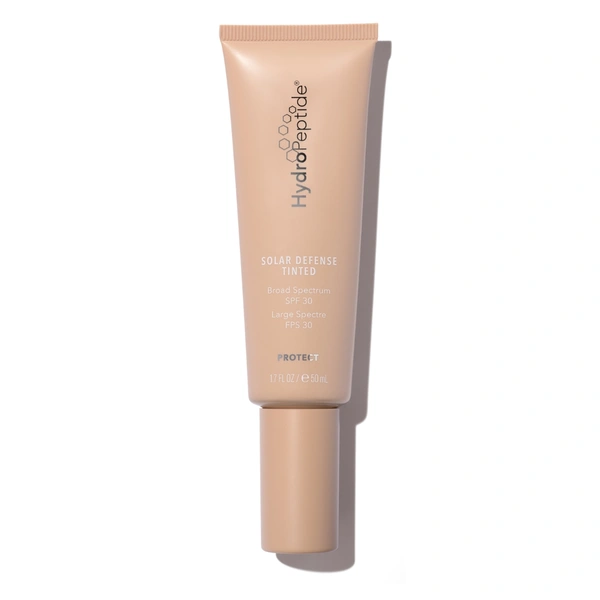 Сонцезахисний крем для обличчя з тонуючим ефектом