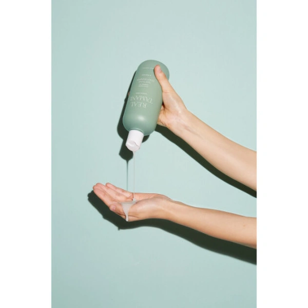 Заспокійливий шампунь з маслом таману у міні форматі