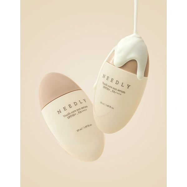 Сонцезахисна крем-сироватка потрійної дії