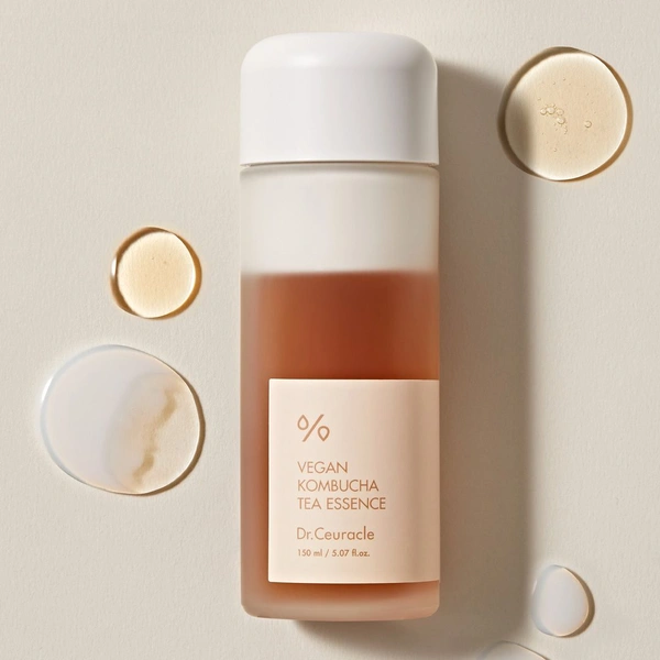 Багатофункціональна кремова есенція з екстрактом комбучі і чорного чаю
