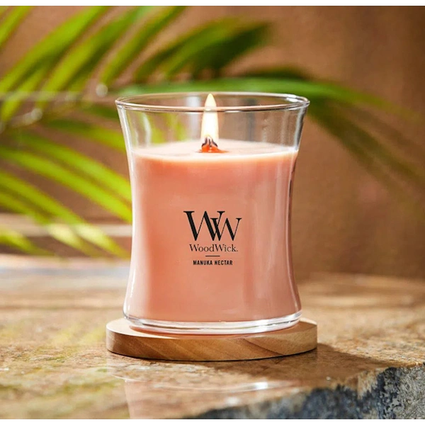 Ароматична свічка з ароматом персику, меду і манго