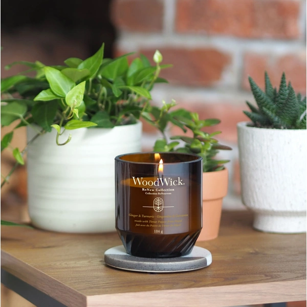 Ароматична свічка з ароматом імбиря та куркуми